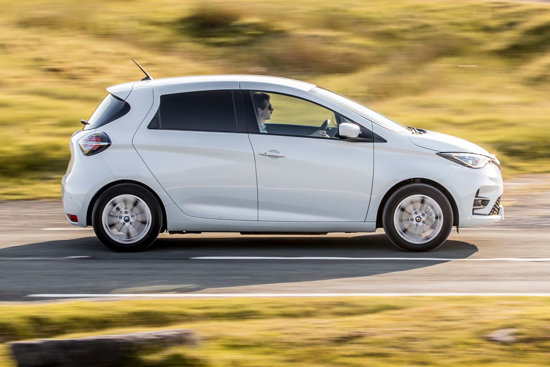 Renault Zoe Van review, 2020, side view, white, driving