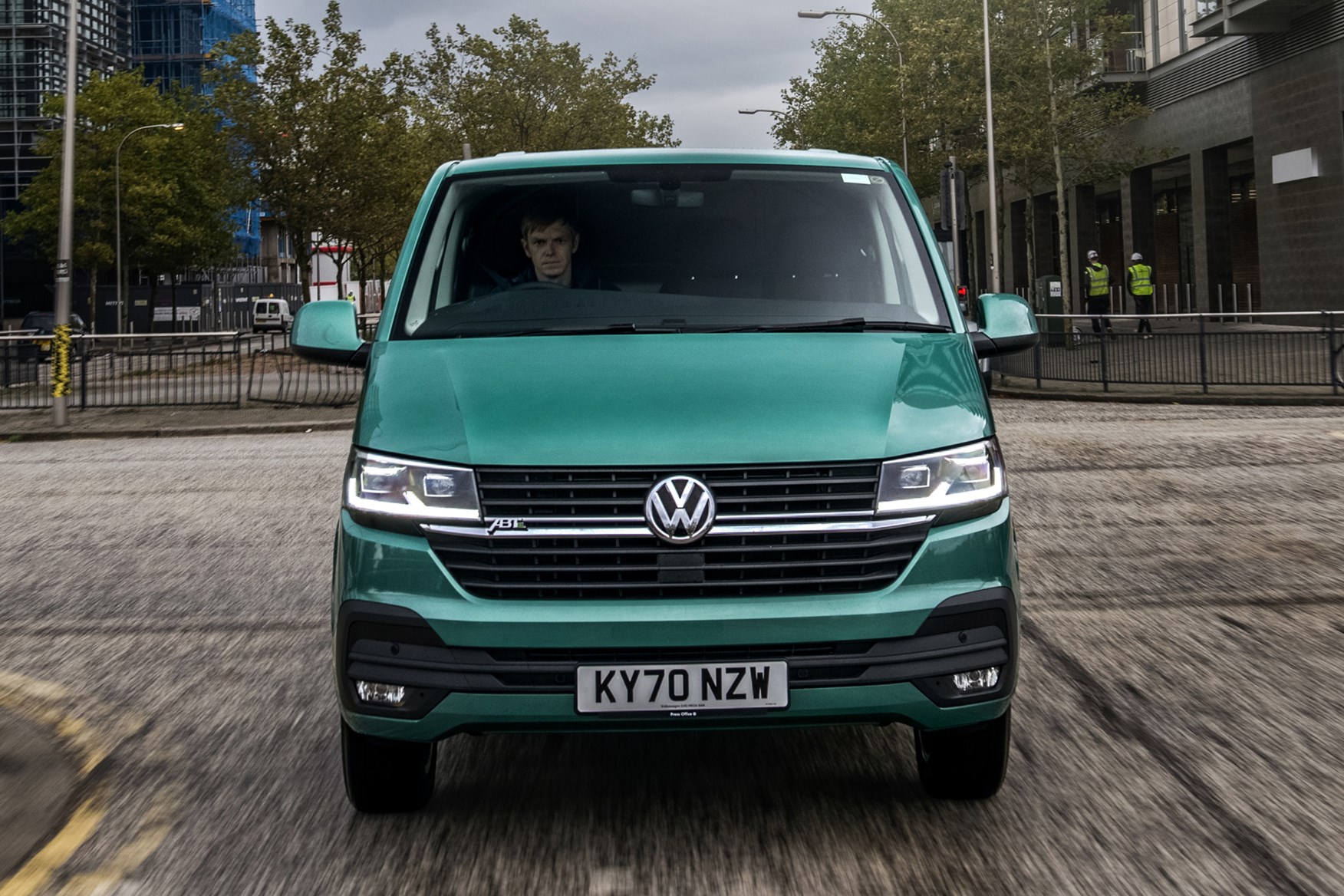 Volkswagen e-Transporter electric van review, 2020, dead-on front view, driving, green