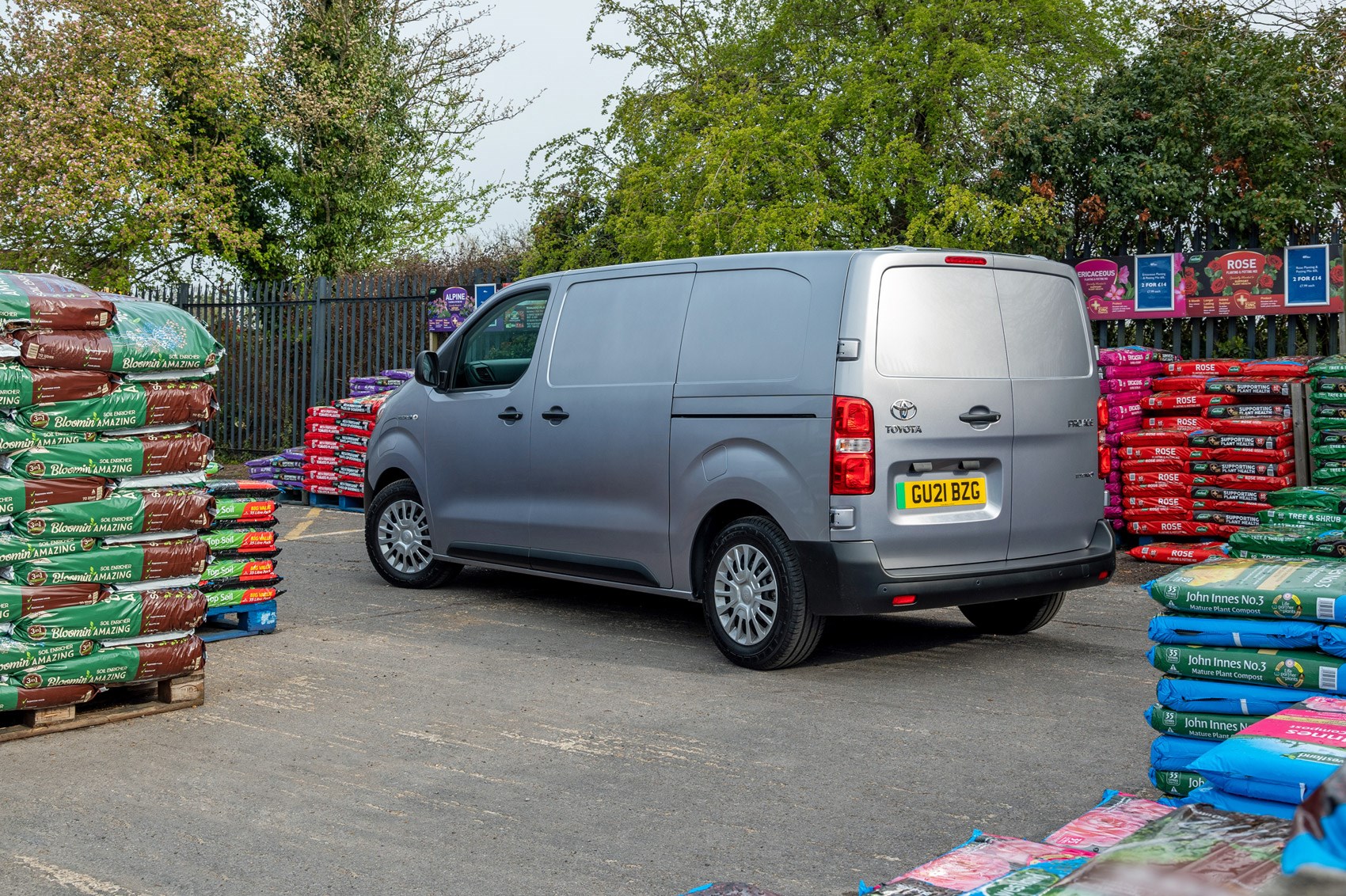 Toyota Proace Electric van review, rear view, garden centre, silver