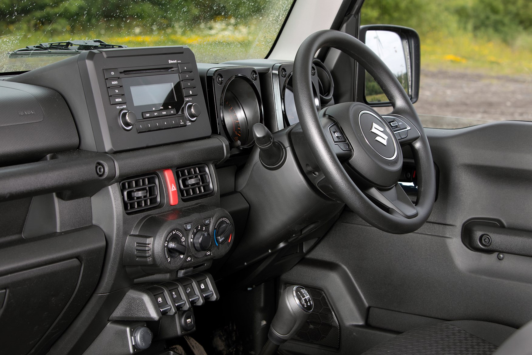 Suzuki Jimny commercial 4x4 review, 2021, cab interior, steering wheel, dashboard