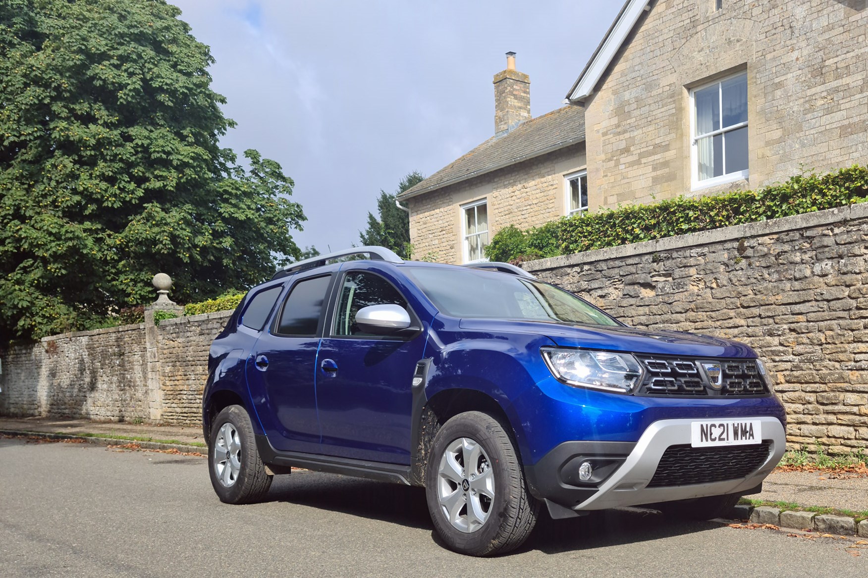 Dacia Duster Commercial review, front view, blue, village street