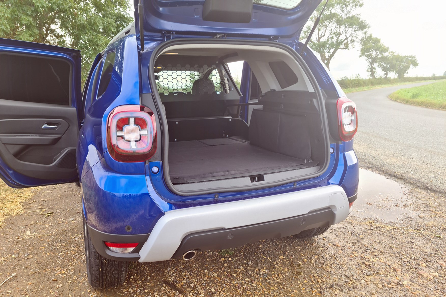 Dacia Duster Commercial review, load space through tailgate, blue