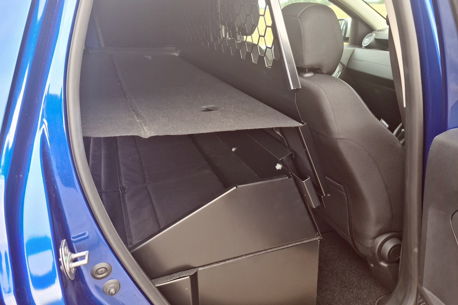Dacia Duster Commercial review, load space cover and bulkhead, side door