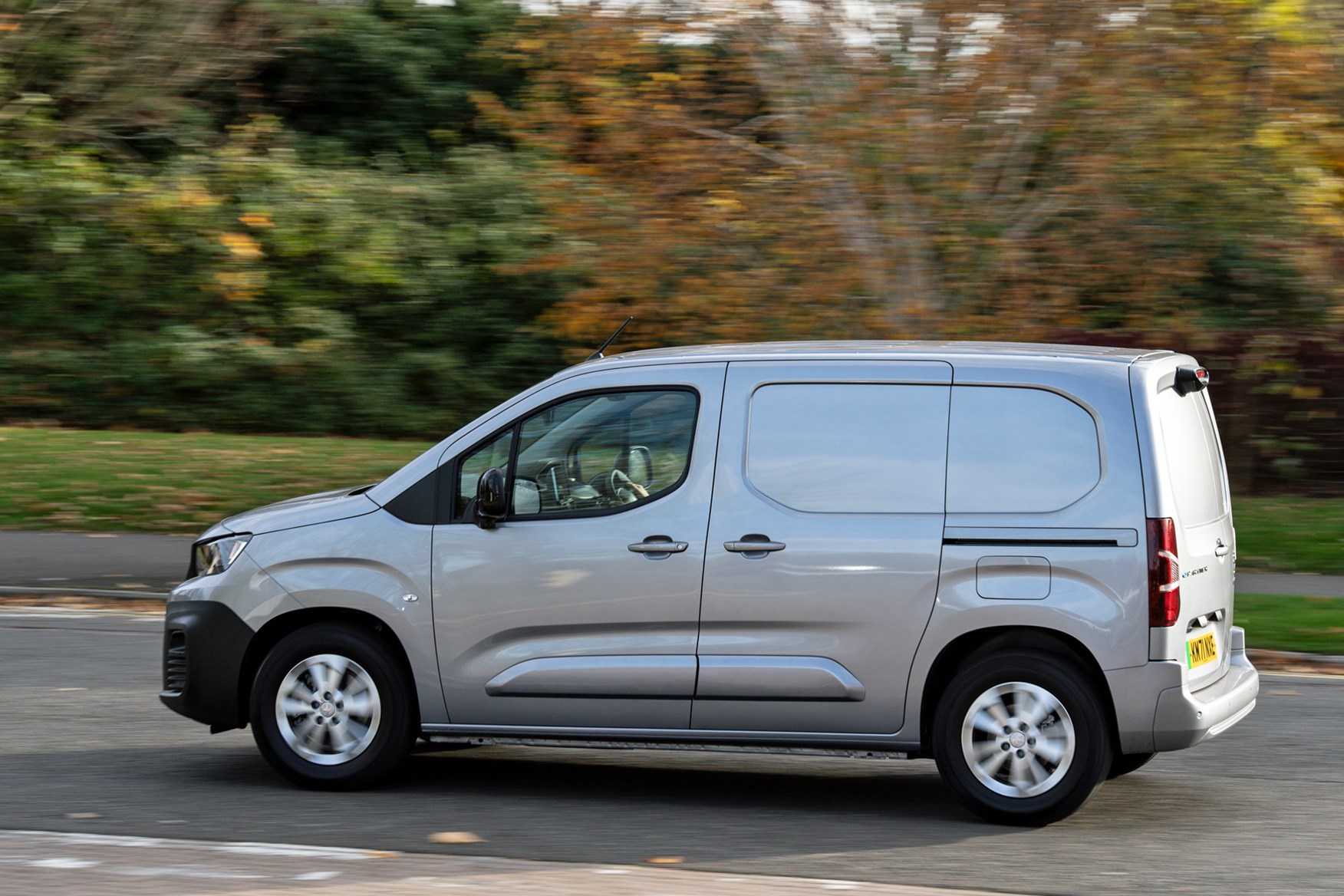 Peugeot e-Expert electric van review - passenger side view, silver, driving