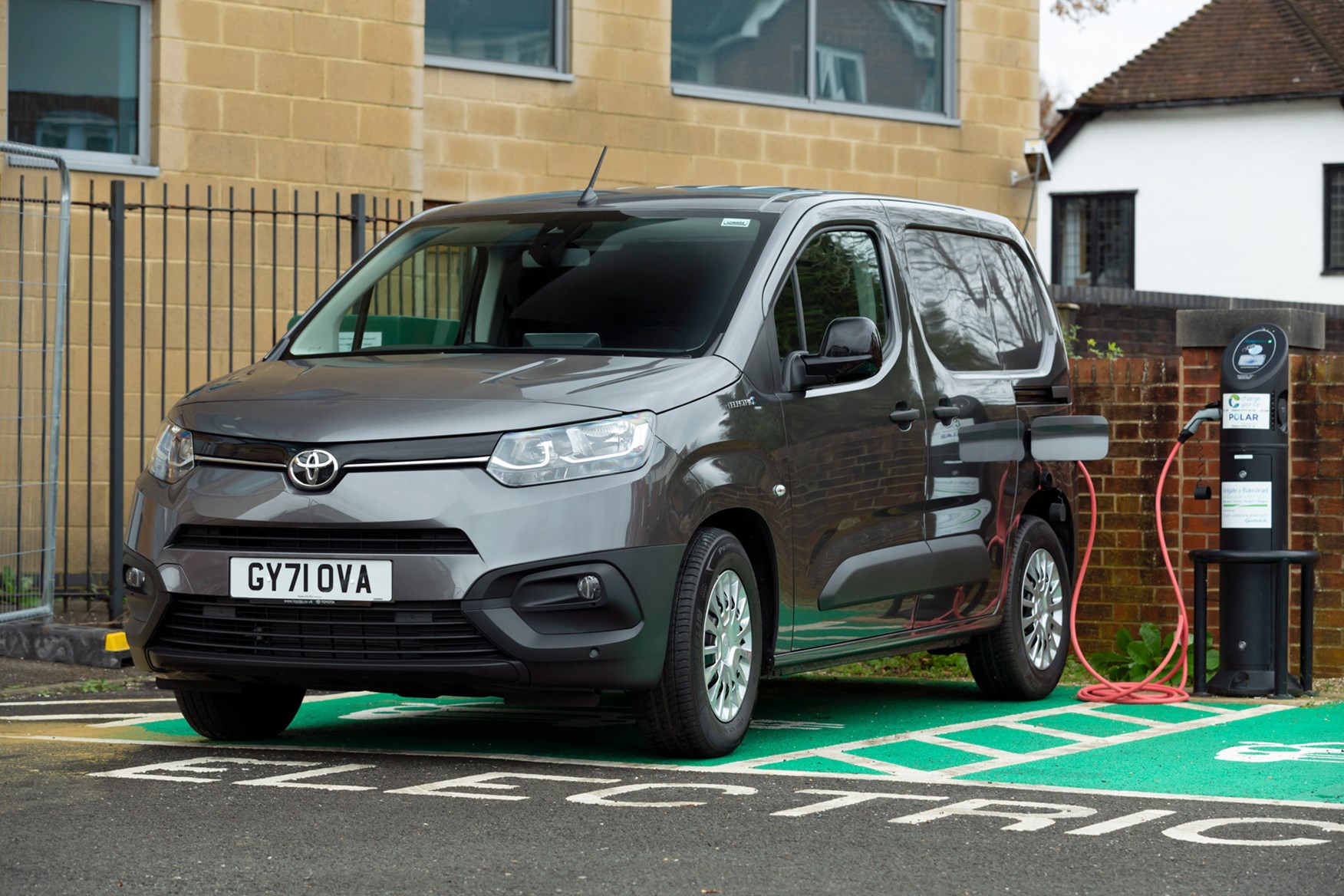 Toyota Proace City Electric van review - front view, grey, charging