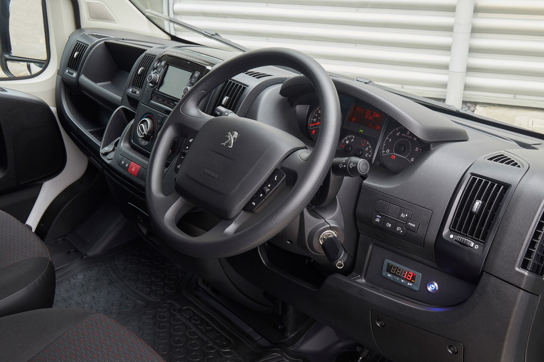 Peugeot e-Boxer electric van review - cab interior, steering wheel