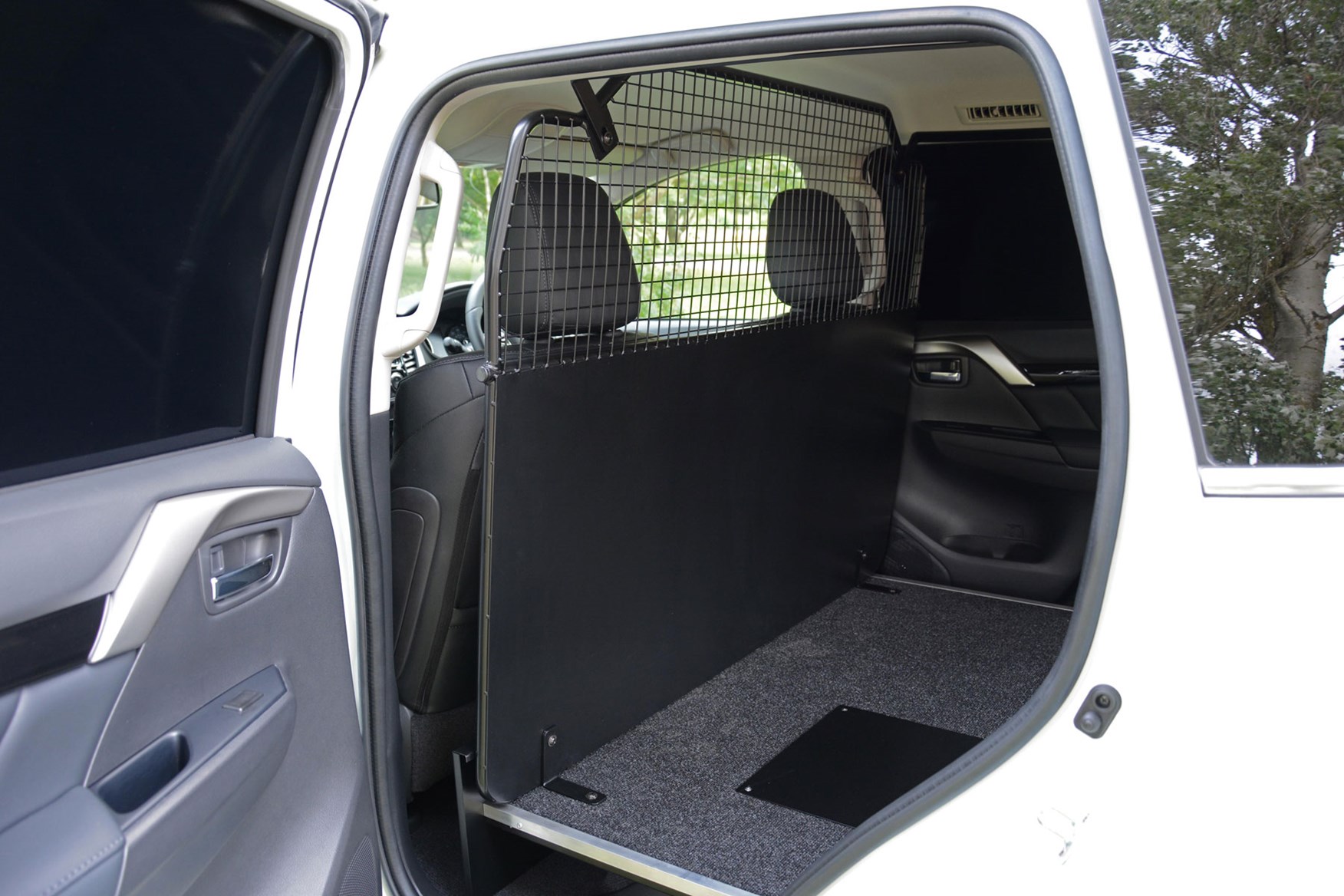 Mitsubishi Outlander Commercial 4x4 van - load area via side door showing load platform with carpet