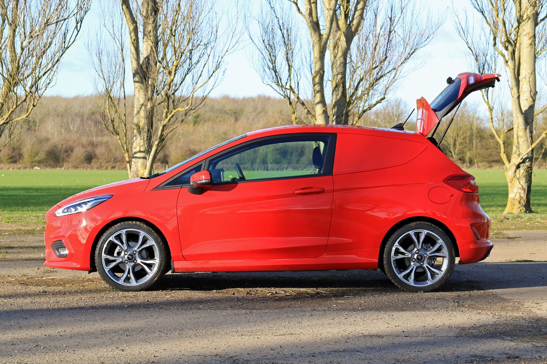 Ford Fiesta Sport Van dimensions - side view with tailgate open, red