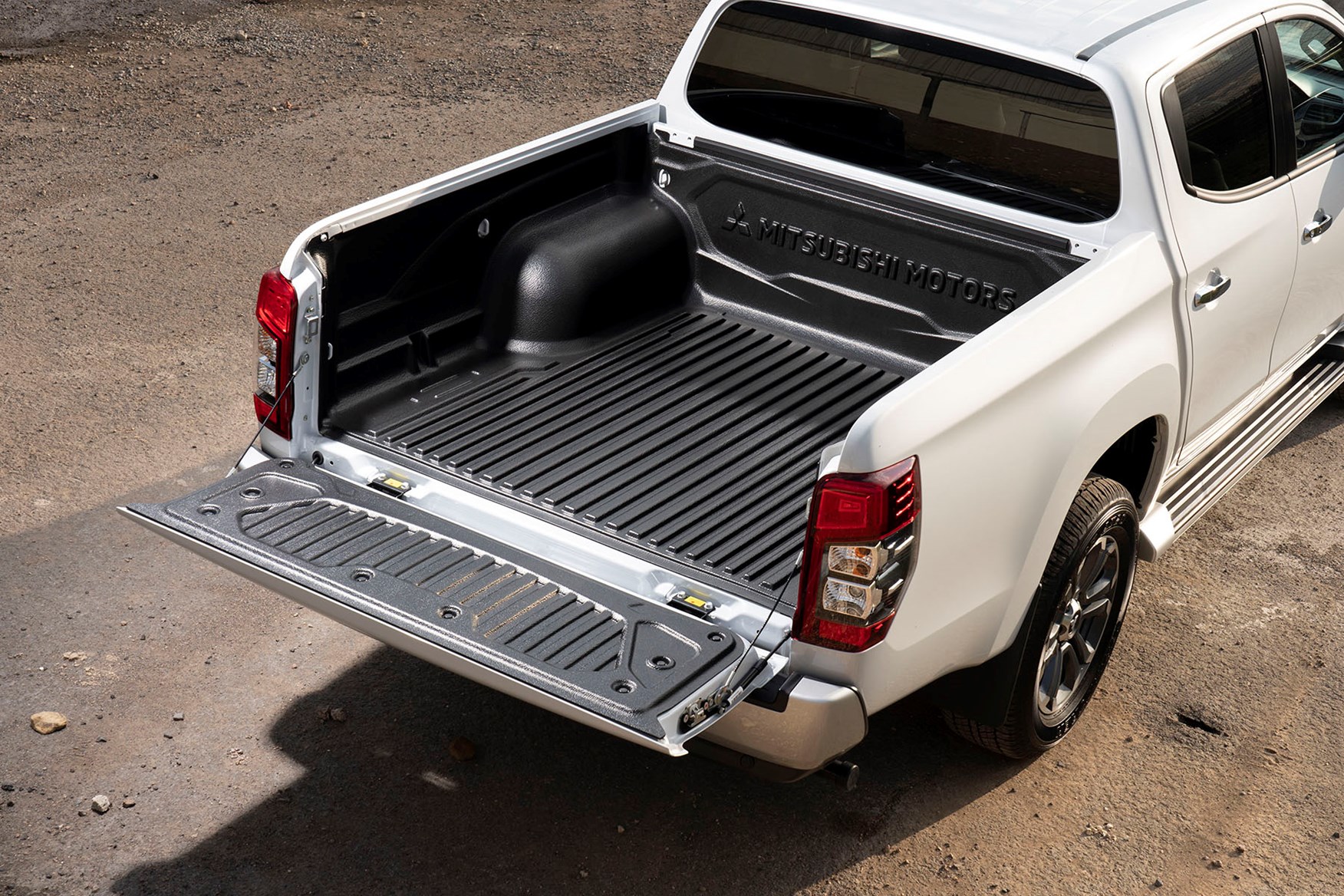 2019 Mitsubishi L200 Series 6, rear load bed, white, with liner