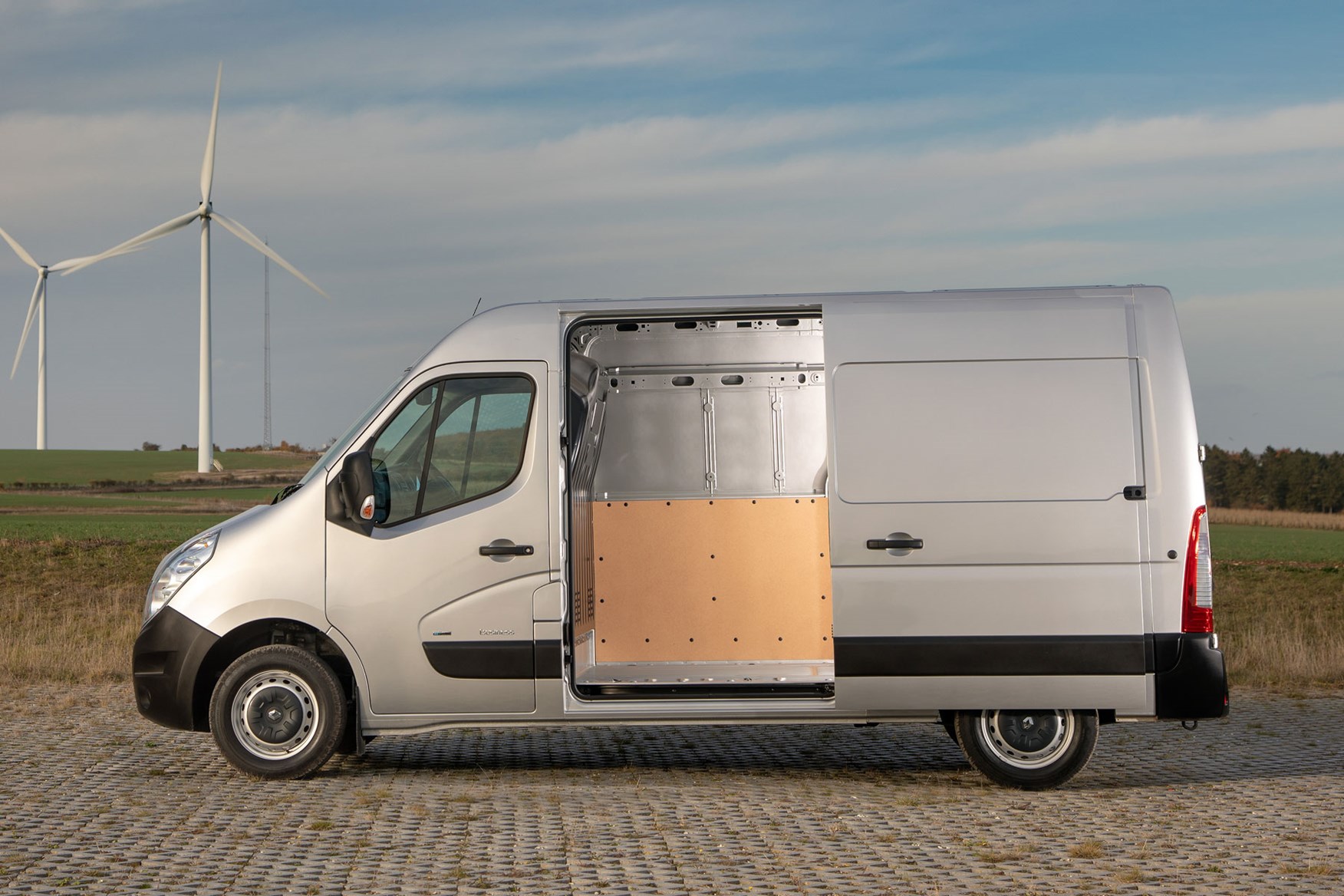 Renault Master ZE electric van - side view, pre-facelift, with loading door open