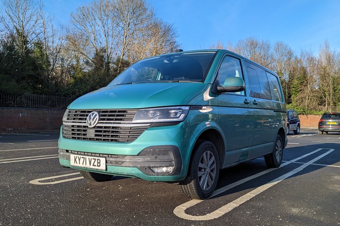 Volkswagen Transporter long-term review (2023): badly parked in a Sainsbury's car park, front three quarter static