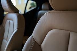 A car interior with leater seats