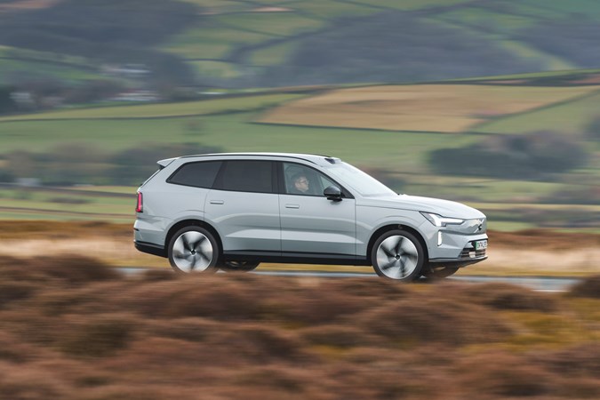 Volvo EX90 driving front exterior