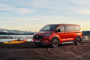 Ford Tourneo Custom 2023 front static on a beach