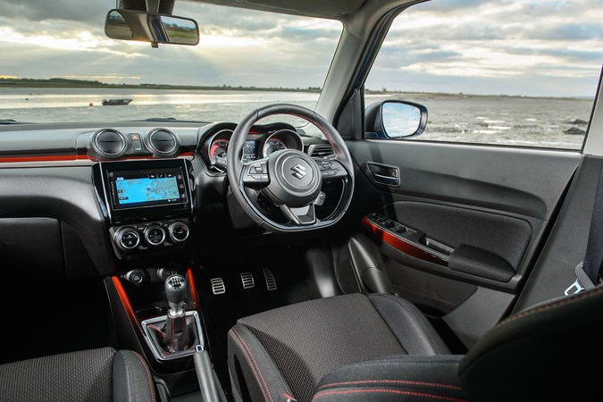 Suzuki Swift Sport (2023) review: front seats and steering wheel