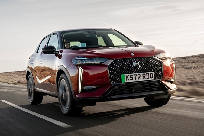 DS 3 E-Tense (2023) review: front three quarter tracking, red car, parched background