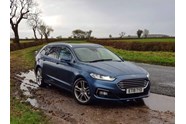 Ford Mondeo estate front three quarters blue