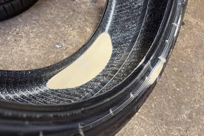 Tirefit goo needs heat and pressure to work, this tyre is full of liquid