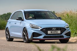 2023 Hyundai i30 N hatchback cornering. Front 3/4 angle.