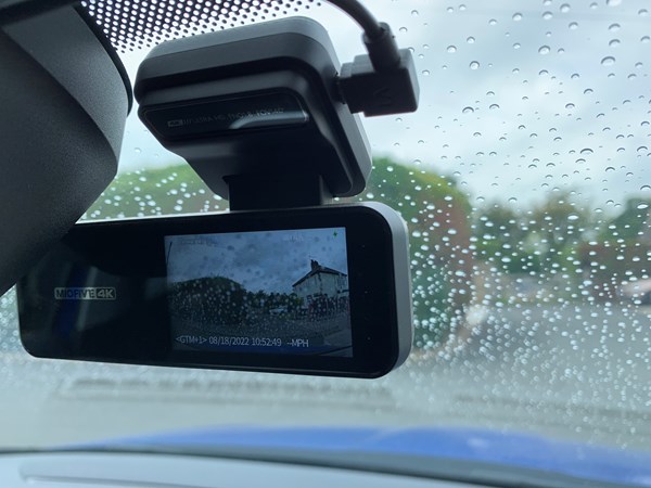 The Miofive connected to a car windscreen