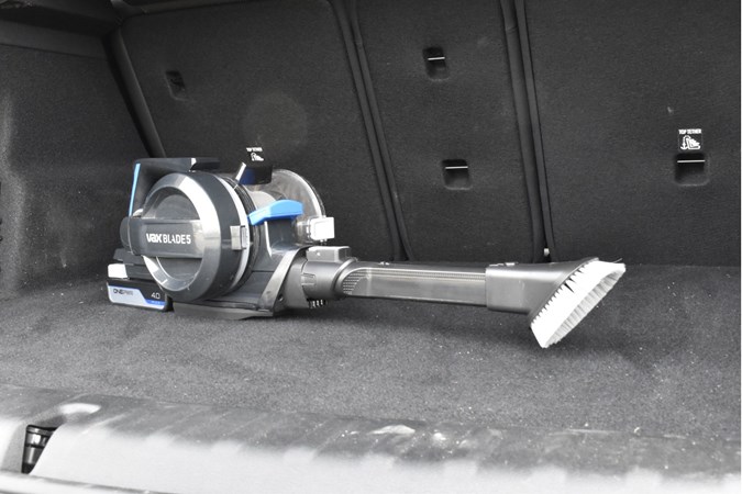 The Vax Blade 5 Dual Pet and Car Cordless Vacuum Cleaner in the boot of a car.
