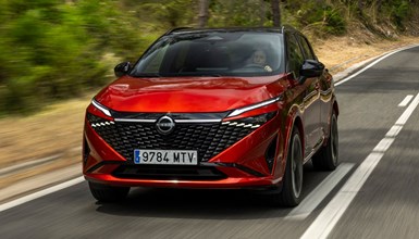 Nissan Qashqai (2025) review: front three quarter driving, red paint