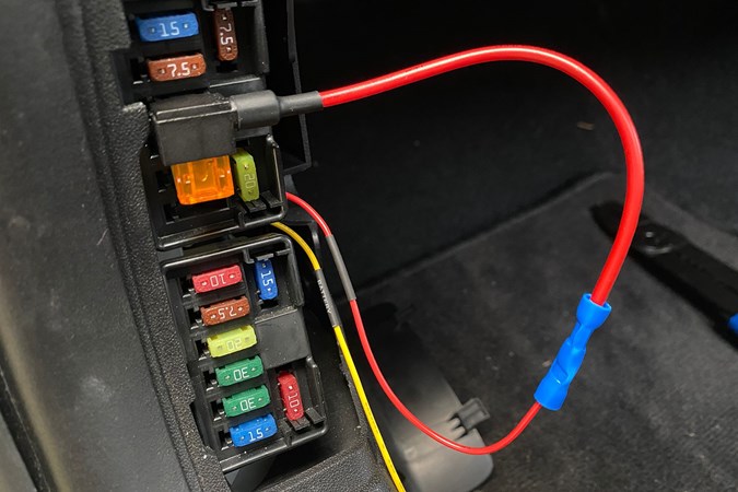 Image of dash cam wires tapped into a car fuse box