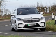 Skoda Enyaq Coupe (2024) review: front three quarter cornering, white paint, British country road