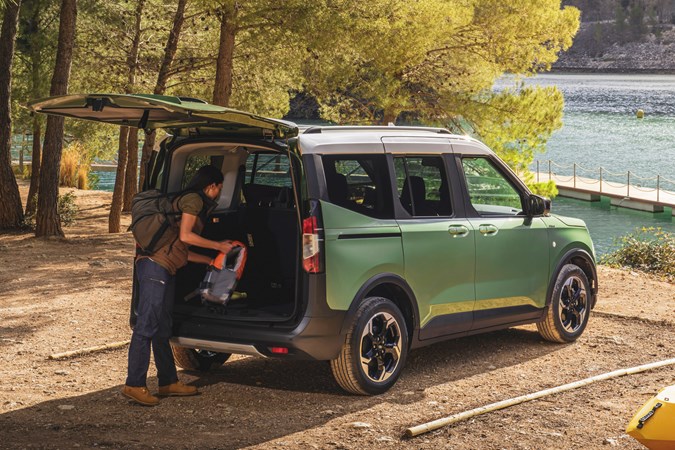 Ford Tourneo Courier rear three quarter static, tailgate open, green paint