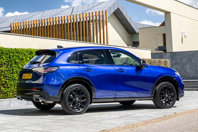 Honda ZR-V (2023) review: rear three quarter static, blue, art gallery in background