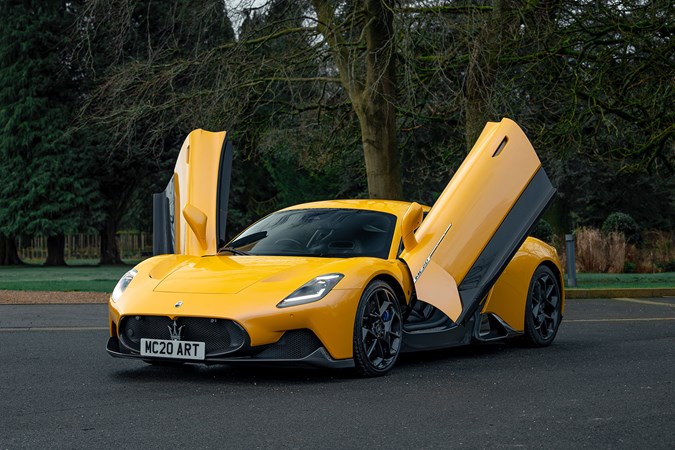 Maserati MC20 (2025) review: front three quarter static, yellow paint, doors open