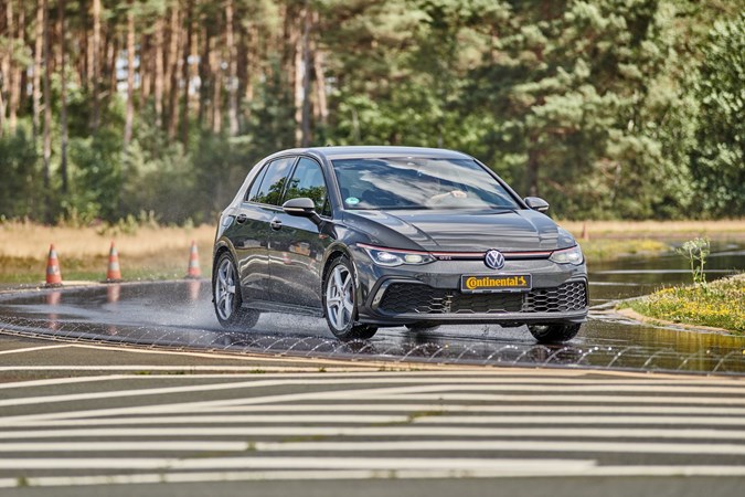 Golf GTI on wet track