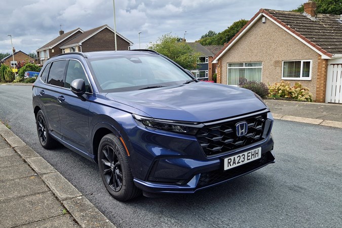 Honda CR-V long-term test, front, blue, parked on street