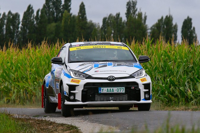 The future of fuel: Toyota GR Yaris hydrogen rally car prototype, driving along a rally stage, racing livery