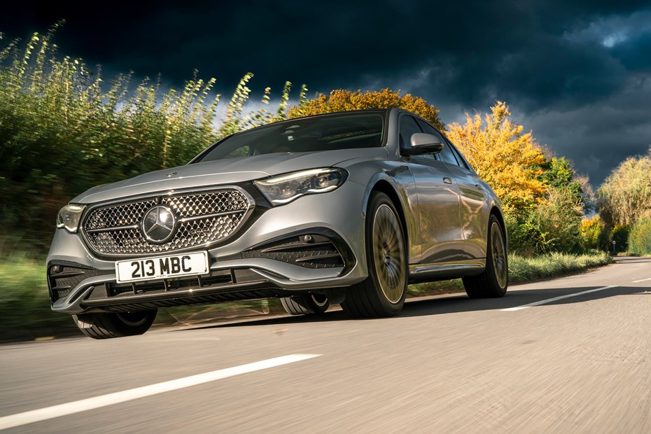 Mercedes-Benz E-Class review, E300e plug-in hybrid, front, silver, driving round corner