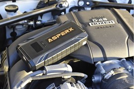 The AsperX Jump Starter on an engine bay