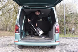 The Hoover HL5 vacuum being used with a van