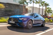 Mercedes-AMG CLE 53 review: front three quarter driving, blue paint