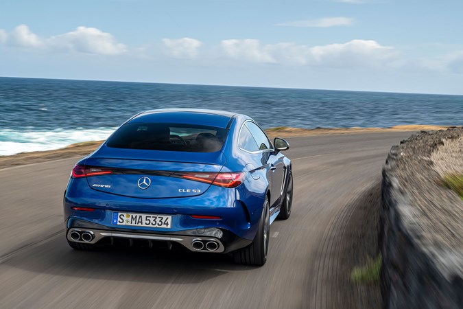 Mercedes-AMG CLE 53 review: rear three quarter cornering, low angle, blue paint