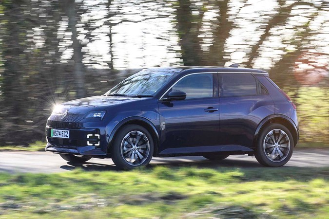 Renault 5 E-Tech review, driving, blue, front three quarters | Parkers