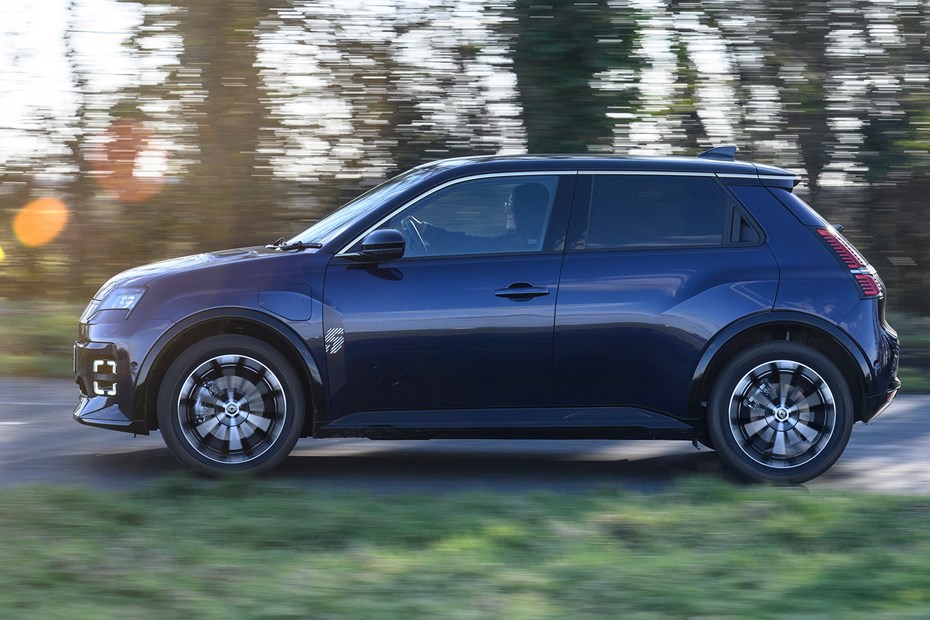 Renault 5 E-Tech review, driving, blue, side | Parkers