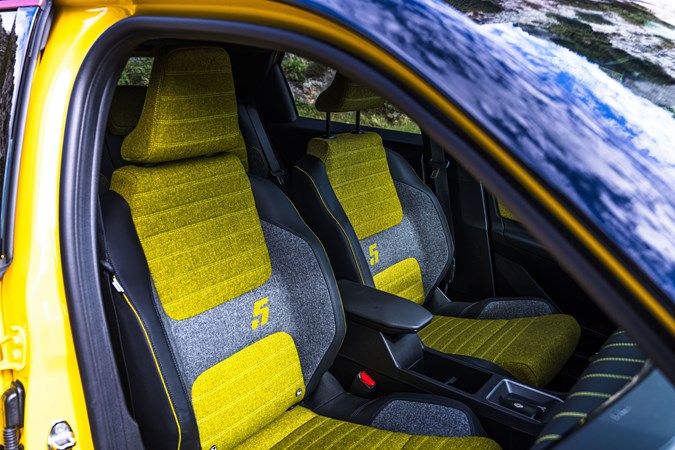 Renault 5 E-Tech (2024) review: front seats, yellow and black fabric upholstery