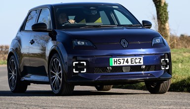 Renault 5 E-Tech review, driving, blue, front three quarters | Parkers