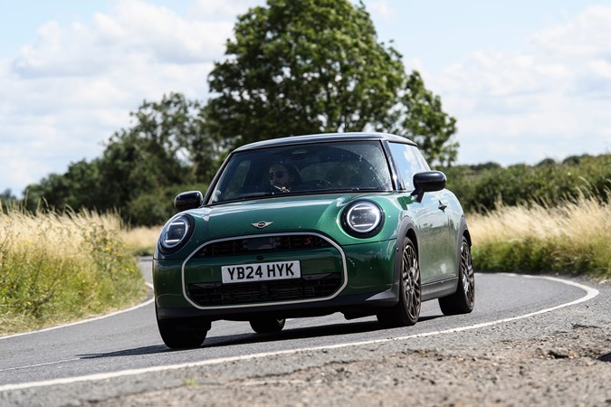 MINI Cooper S long-term test: front three quarter cornering, low angle, green paint