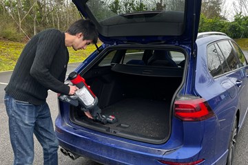 Cleaning the boot of a car with the Henry Quick