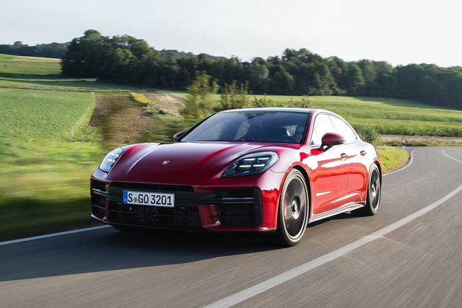 Porsche Panamera GTS: front three quarter driving, red paint, sunlight