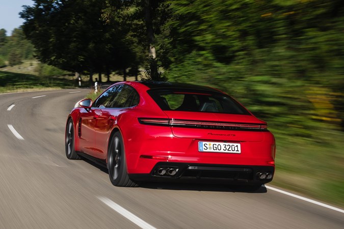 Porsche Panamera GTS: rear three quarter driving, red paint