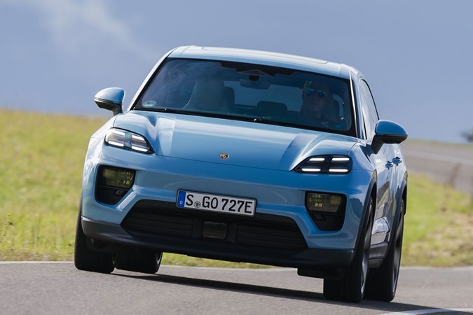 Porsche Macan Electric (2024) review: front cornering, blue paint, low angle