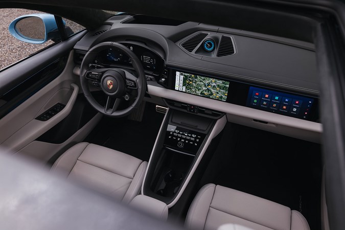 Porsche Macan Electric (2024) review: dashboard and front seats, black and cream leather upholstery