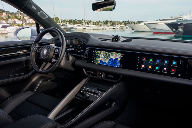 Porsche Macan (2024) review: dashboard and infotainment system, black upholstery